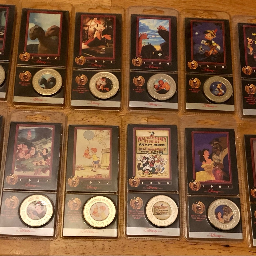 Disney Coins sealed Card Collector Set -12 packs (see photos)